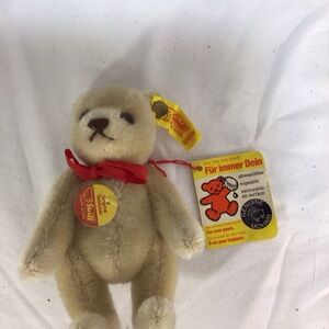 Steiff Beige Teddy Bear with Red Bow
